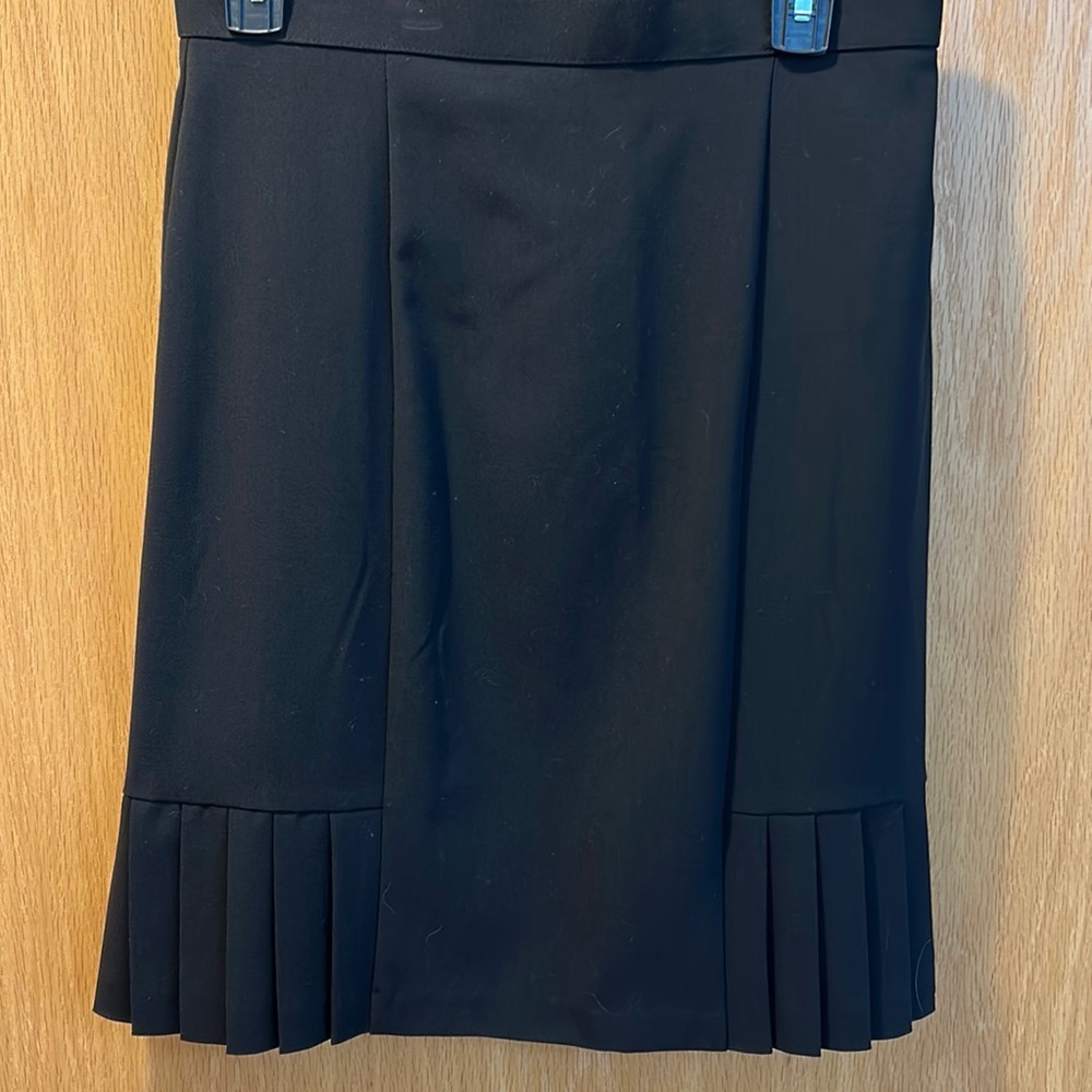 Size 8 black pleaded skirt.